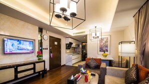 A modern hotel room with a living area, a kitchen, and a dining area. - Boudl Gaber (Riyadh)