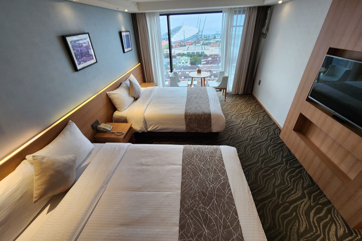 family twin room, ocean view (deluxe) | 1 bedroom, in-room safe, bed sheets