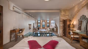 Egyptian cotton sheets, premium bedding, free minibar, in-room safe
