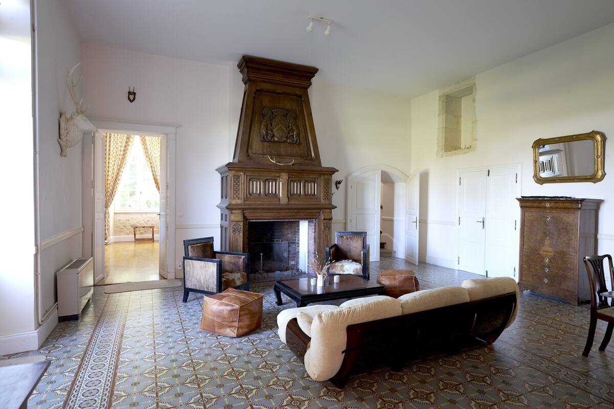 Vignes Cottage | Living area | Flat-screen TV, fireplace
