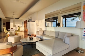 Design Villa | Living area | 22-inch flat-screen TV with cable channels, TV, DVD player
