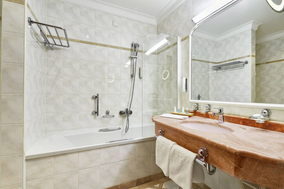 hair dryer, bathrobes, towels, soap