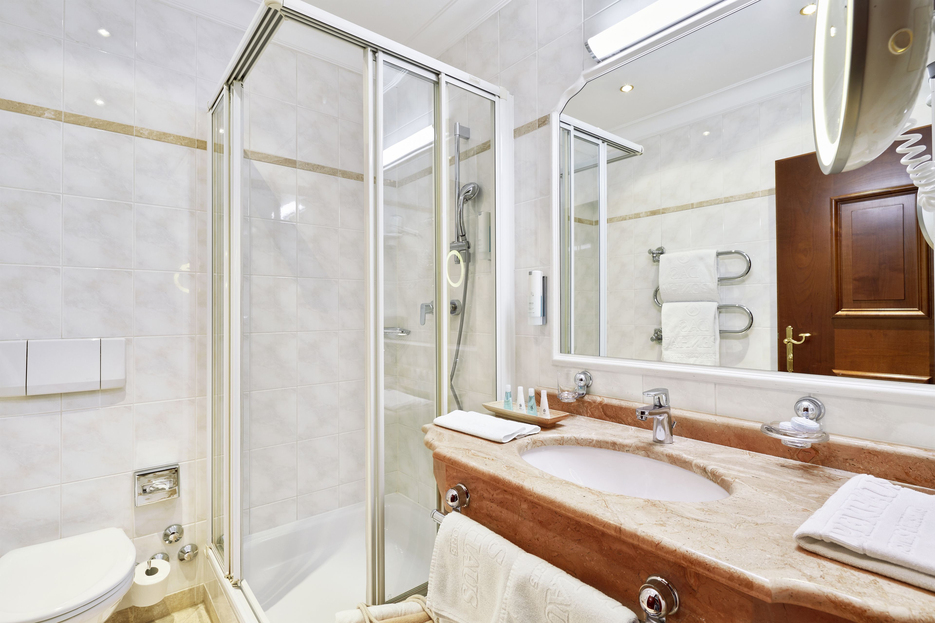 hair dryer, bathrobes, towels, soap