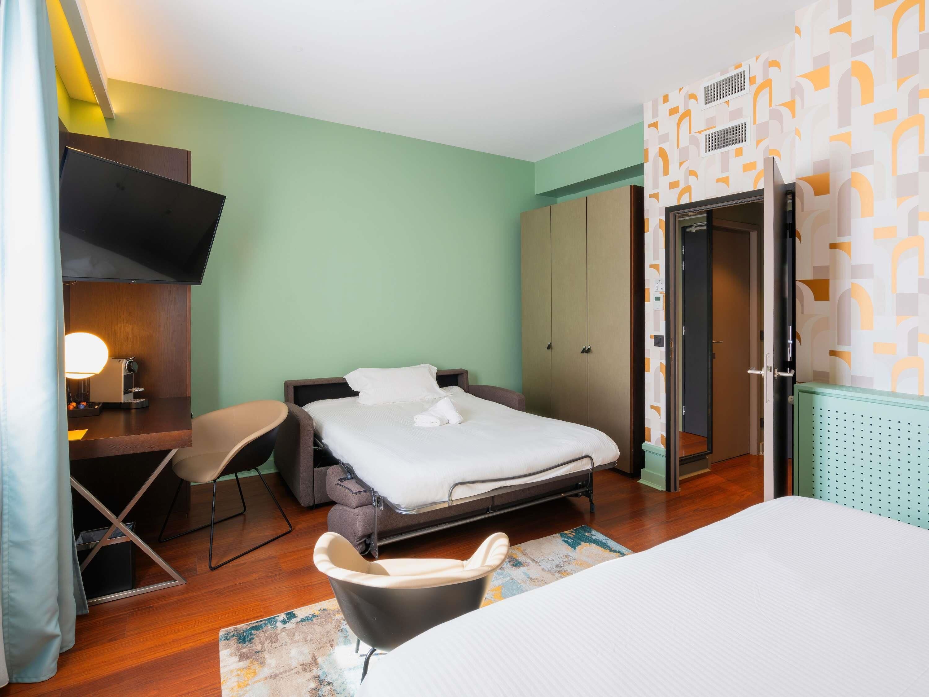 Familienzimmer, 1 Doppelbett und Schlafsofa | Hochwertige Bettwaren, Minibar, Zimmersafe, Schreibtisch