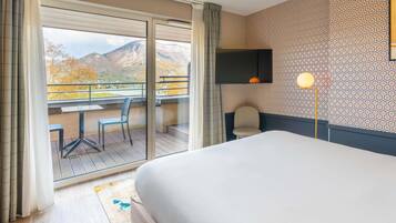 Ropa de cama de alta calidad y minibar