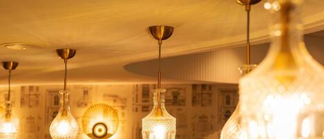 A ceiling with multiple hanging light fixtures.