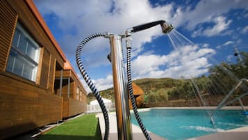 Seasonal outdoor pool, pool umbrellas