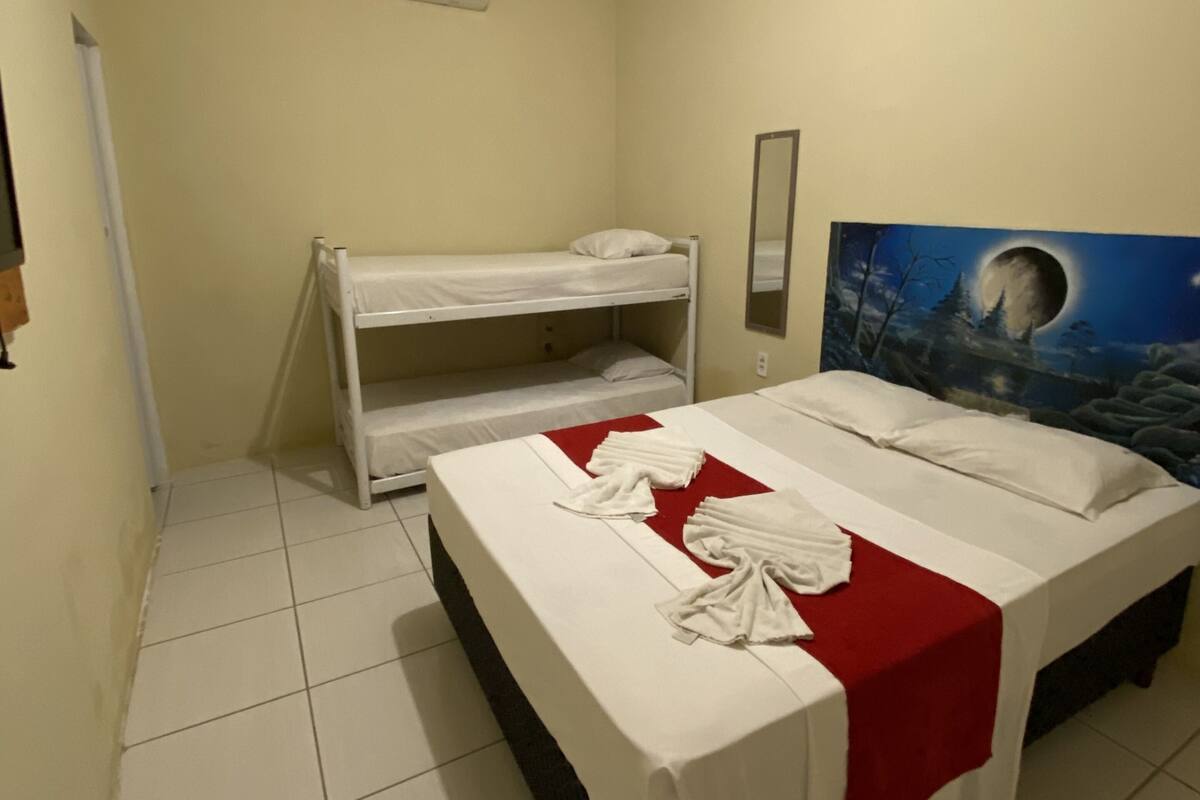 Standard Quadruple Room | Minibar, iron/ironing board (on request), WiFi (free), bed sheets