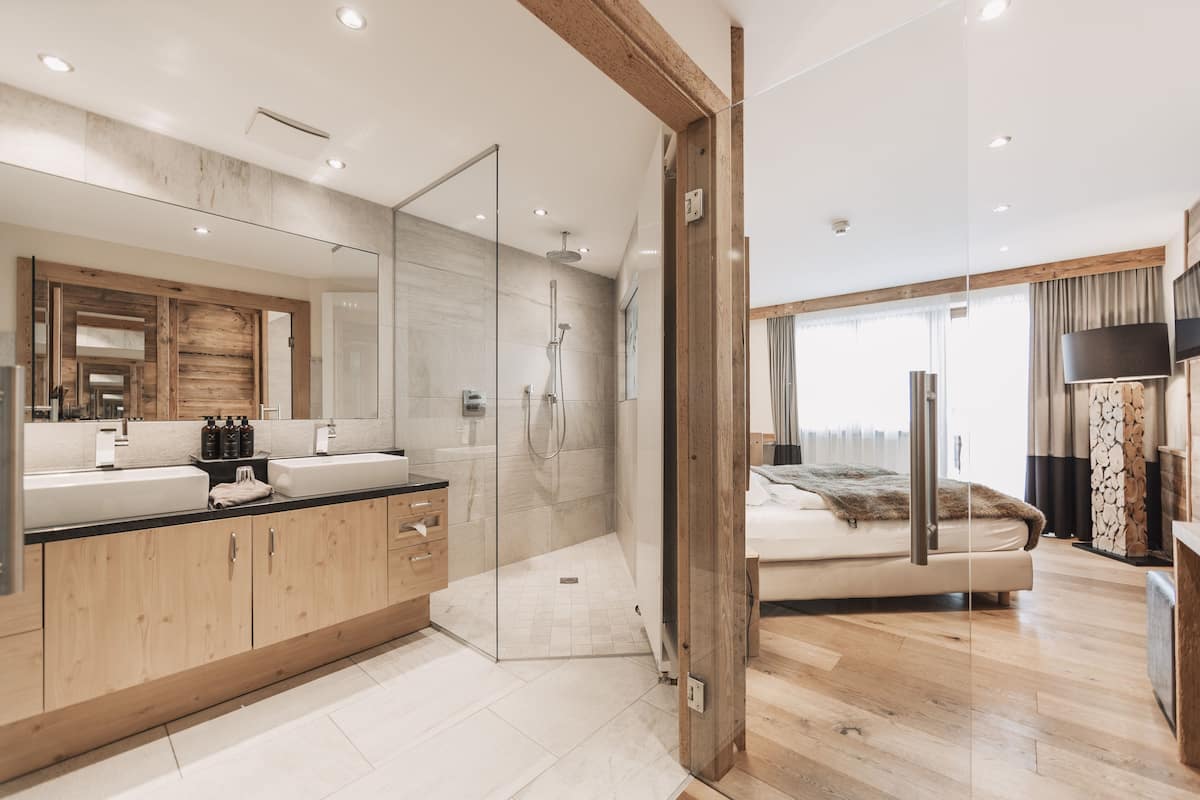 superior suite (family life style) | bathroom | shower, rainfall showerhead, free toiletries, hair dryer