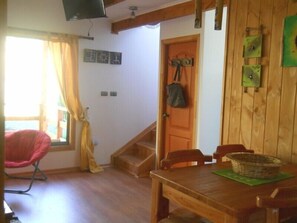 Family Bungalow | Living area | 30-inch LED TV with cable channels, TV