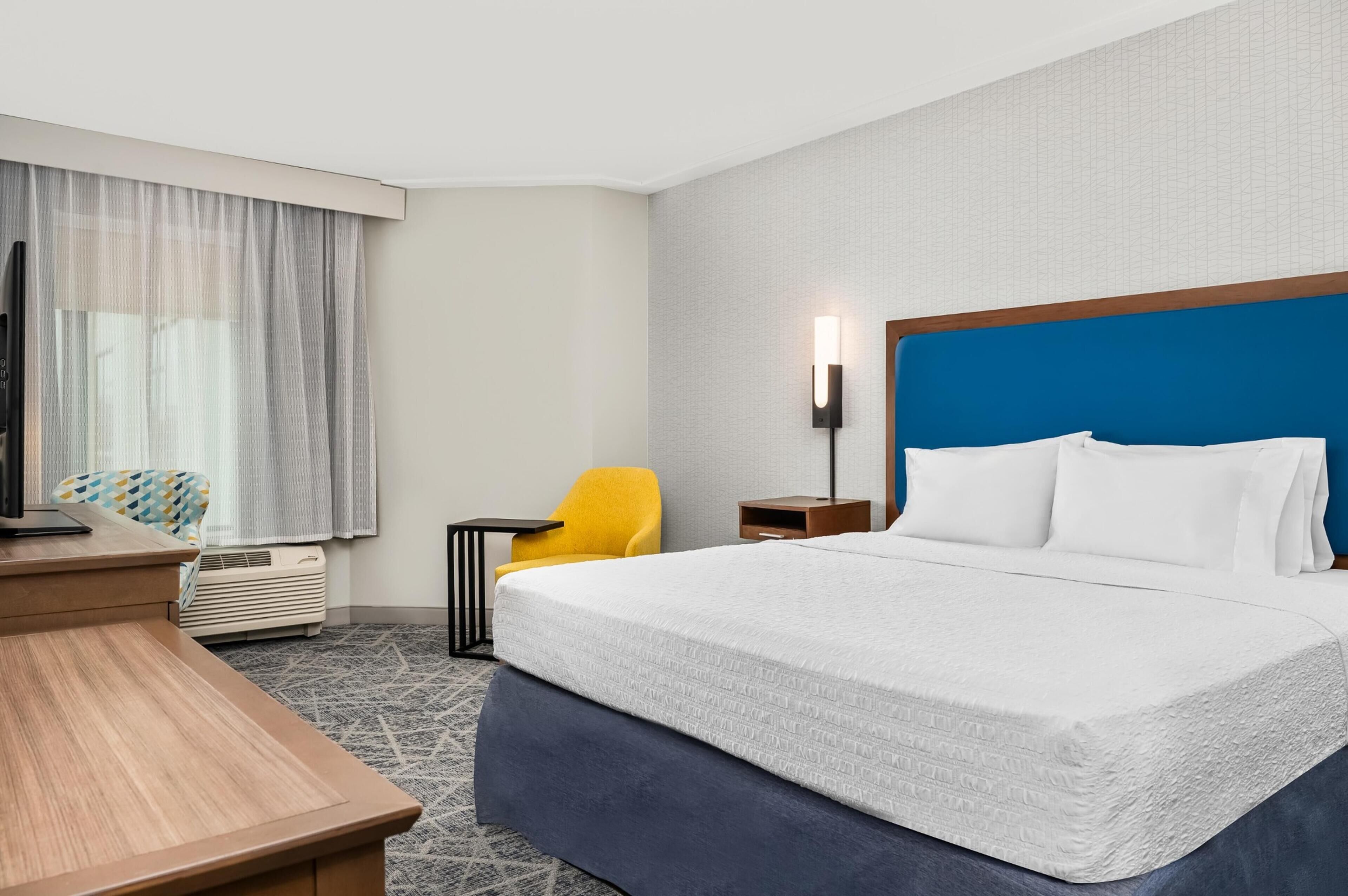 Blackout drapes, iron/ironing board, free cribs/infant beds