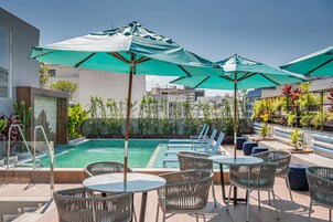 Outdoor pool, pool umbrellas, pool loungers