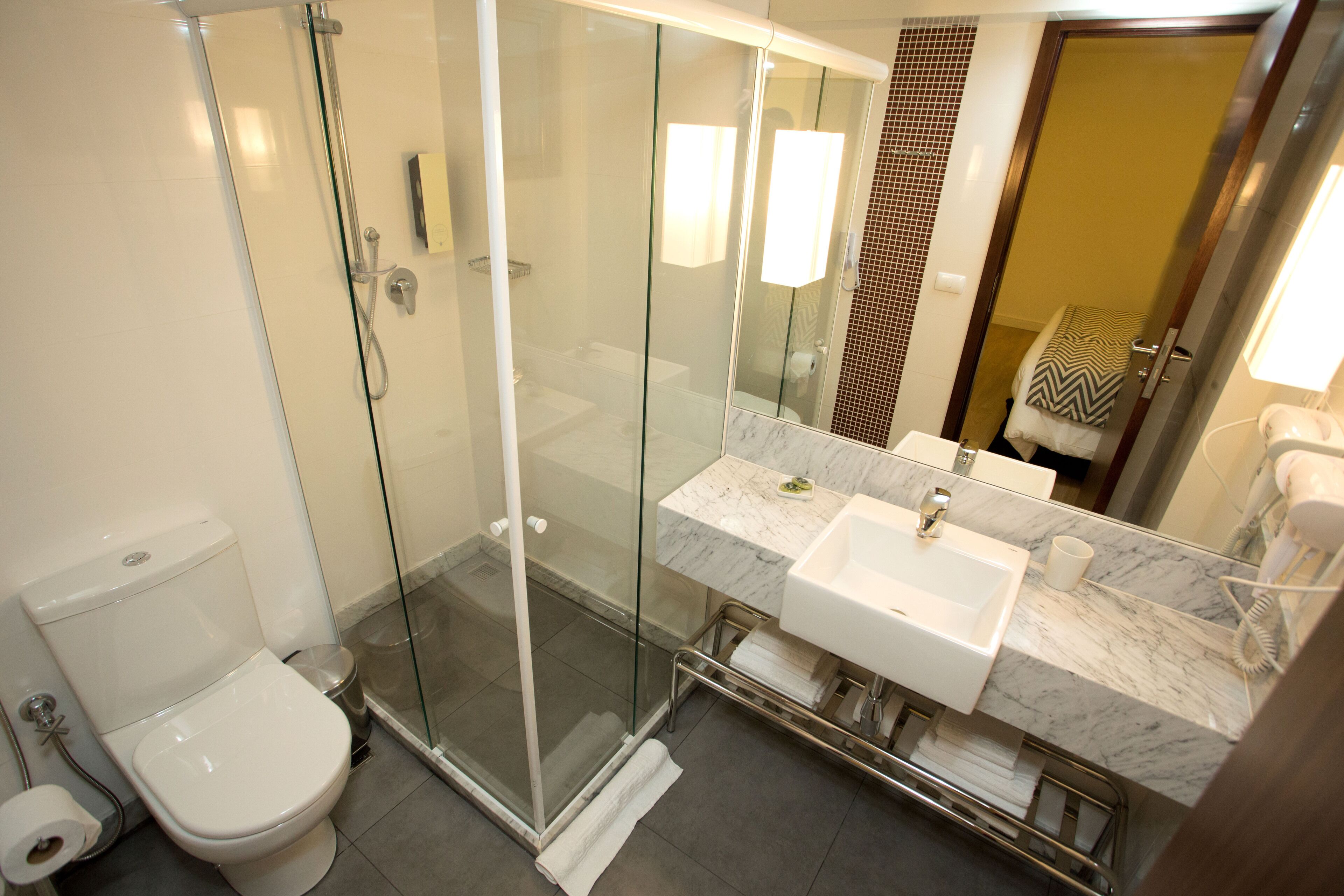 shower, free toiletries, hair dryer, towels