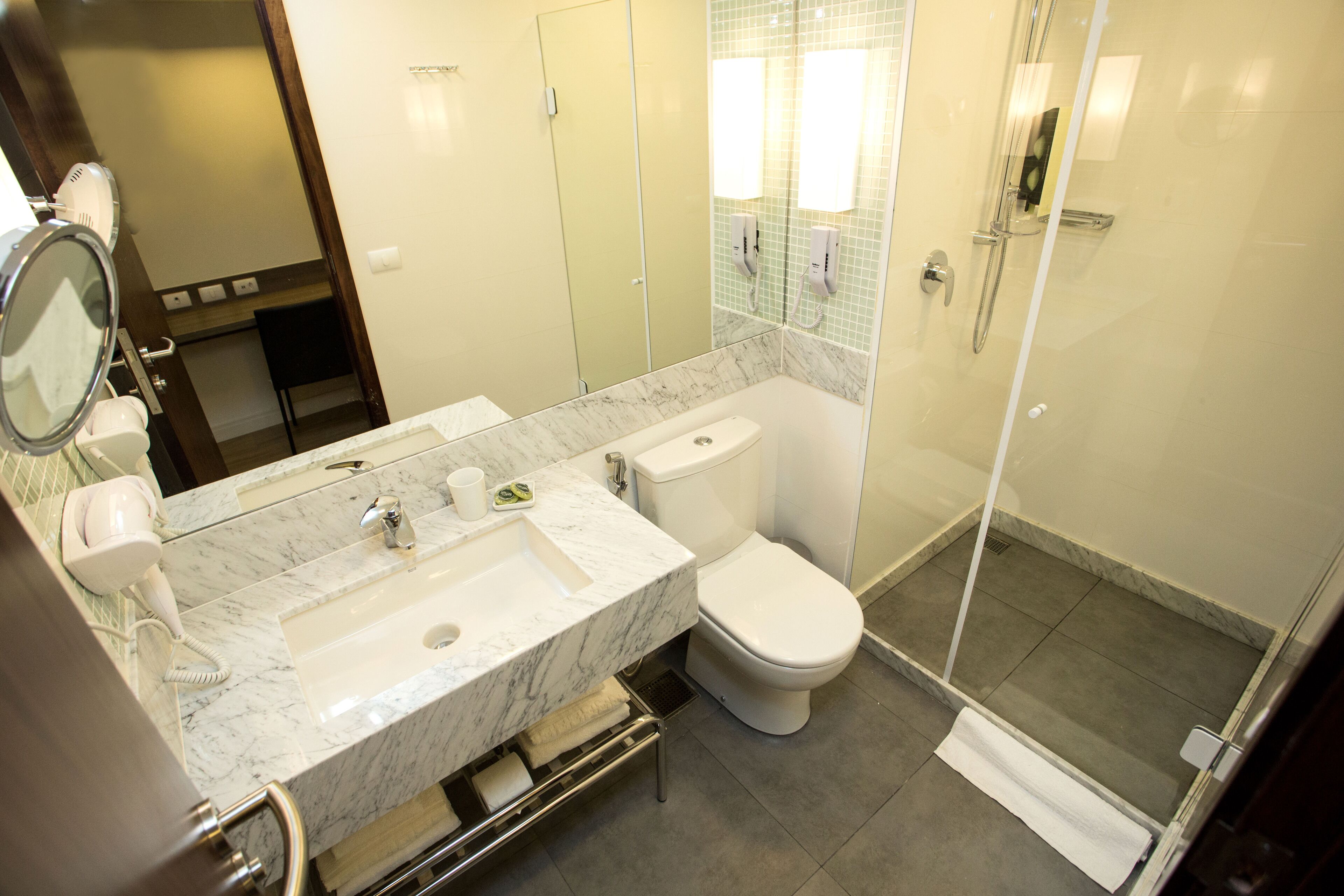 shower, free toiletries, hair dryer, towels