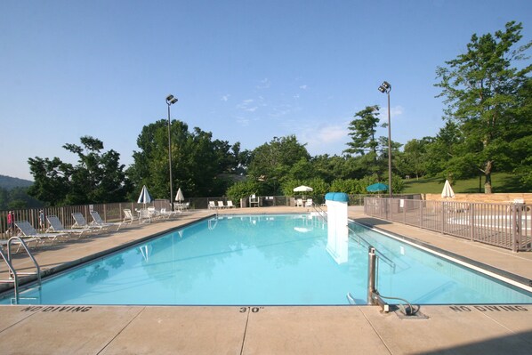 Seasonal outdoor pool, pool umbrellas, pool loungers