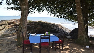 Breakfast, lunch served; local and international cuisine, beach views
