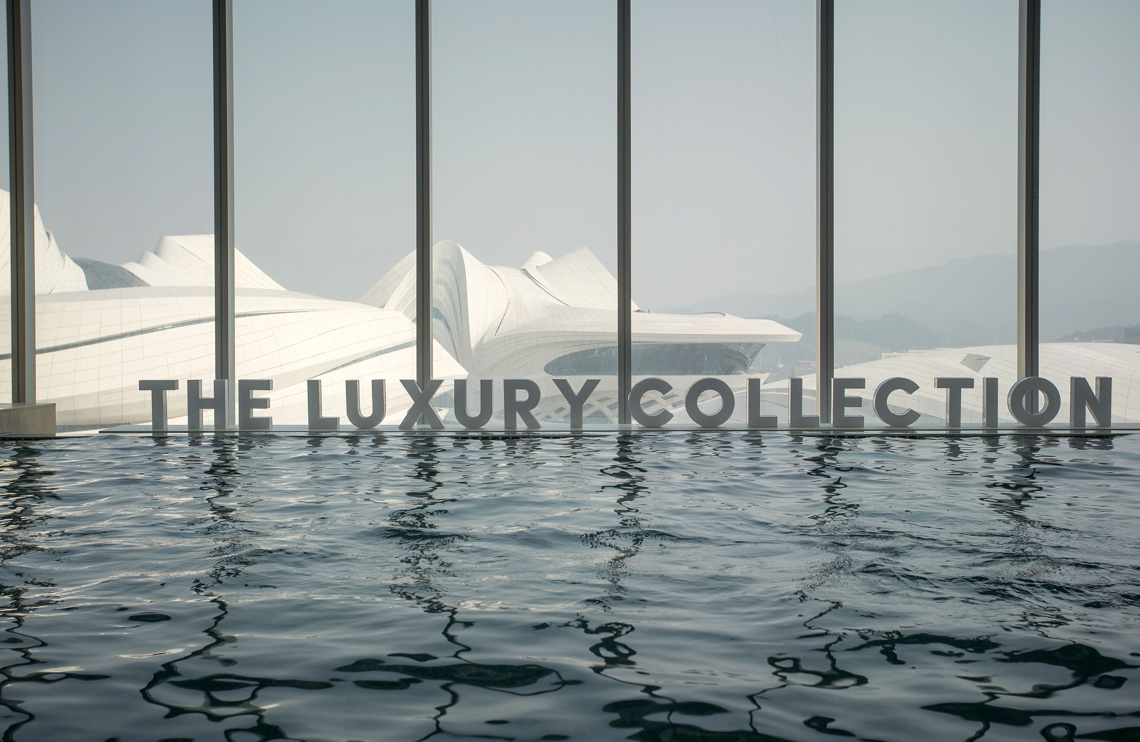 indoor pool, open 6:00 am to 11:00 pm, pool loungers, lifeguards on site