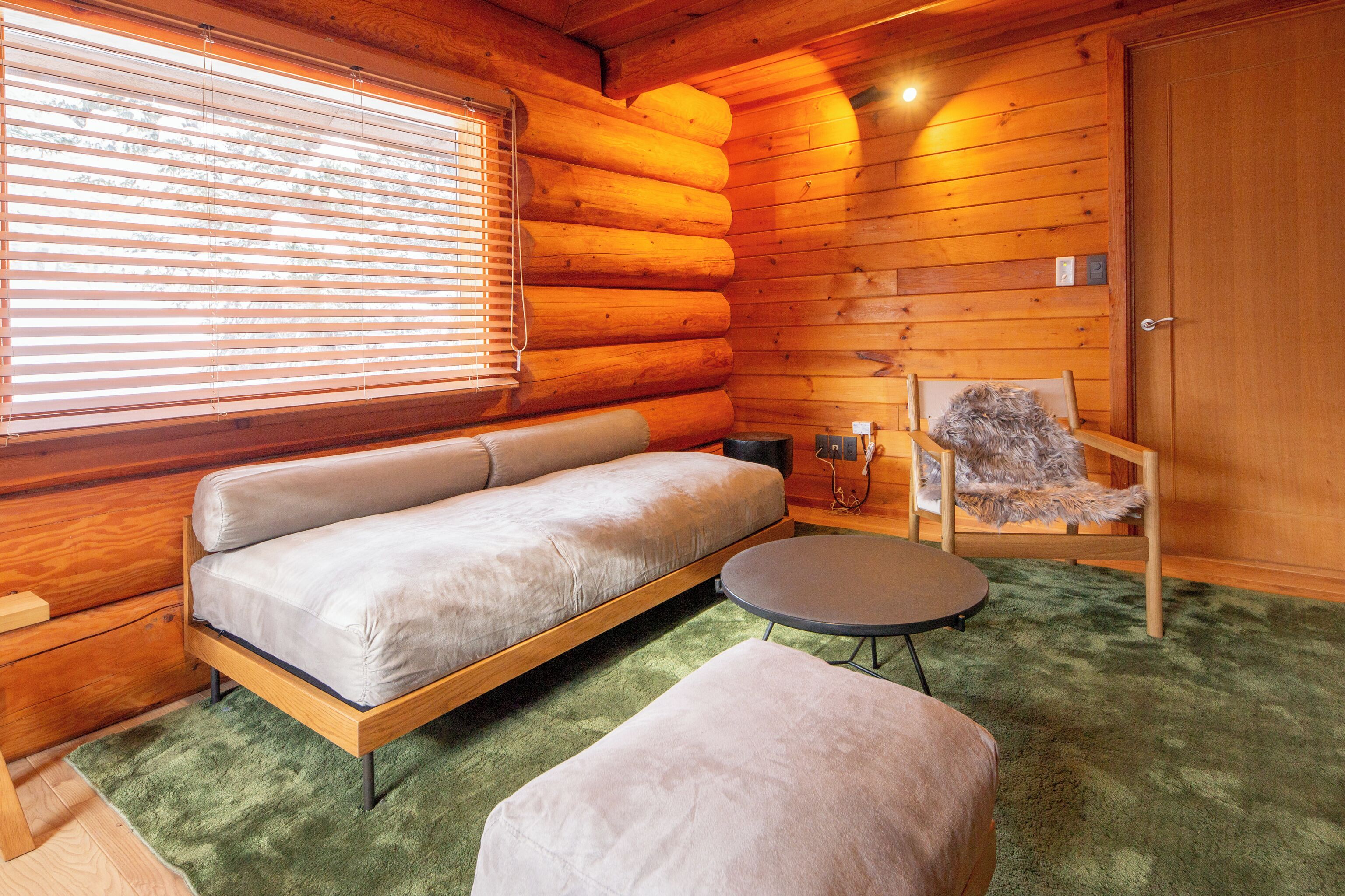 deluxe room | living area | flat-screen tv, heated floors