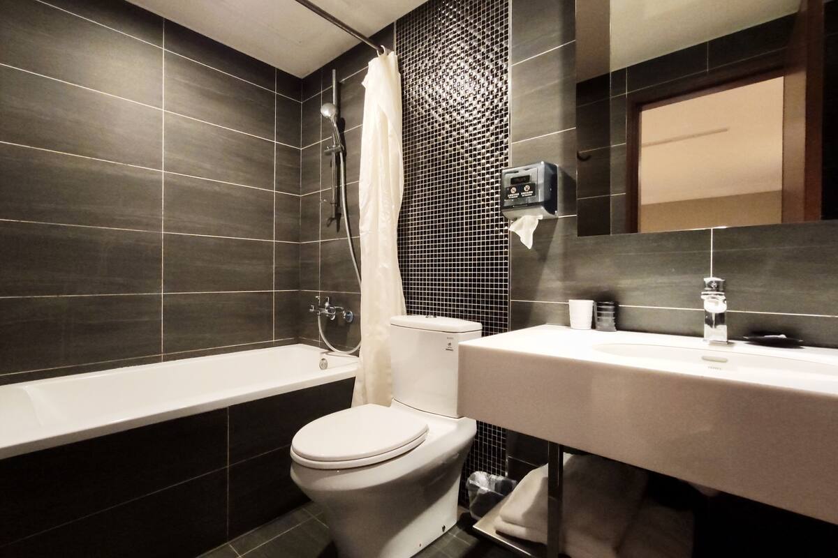 superior double room | bathroom | shower, free toiletries, hair dryer, slippers