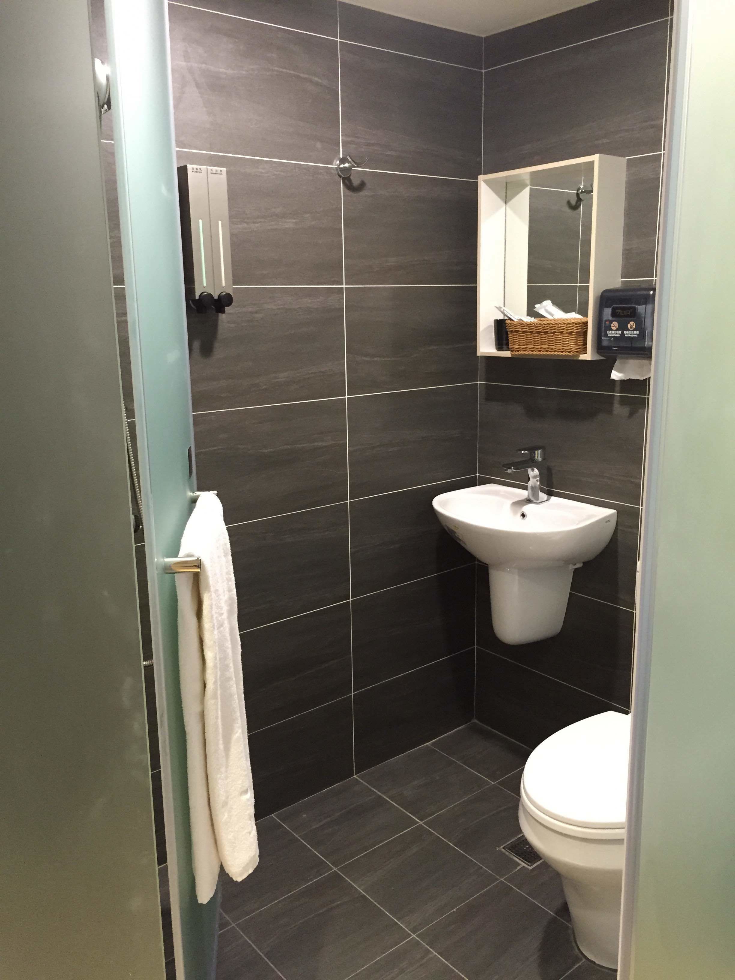 economy single room | bathroom | shower, free toiletries, hair dryer, slippers