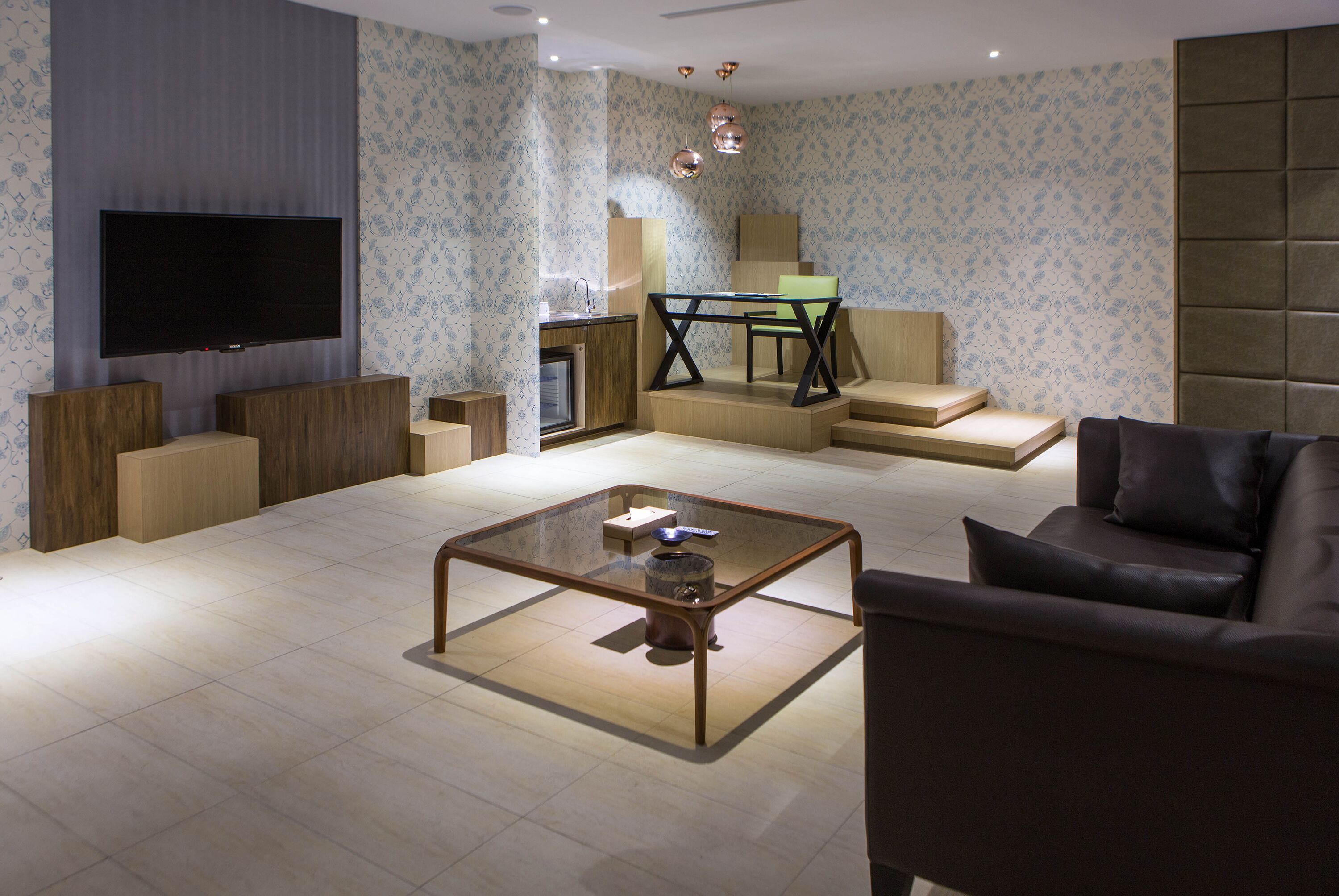 platinum suite check in time starts from 6pm | living room | 42-inch tv with digital channels