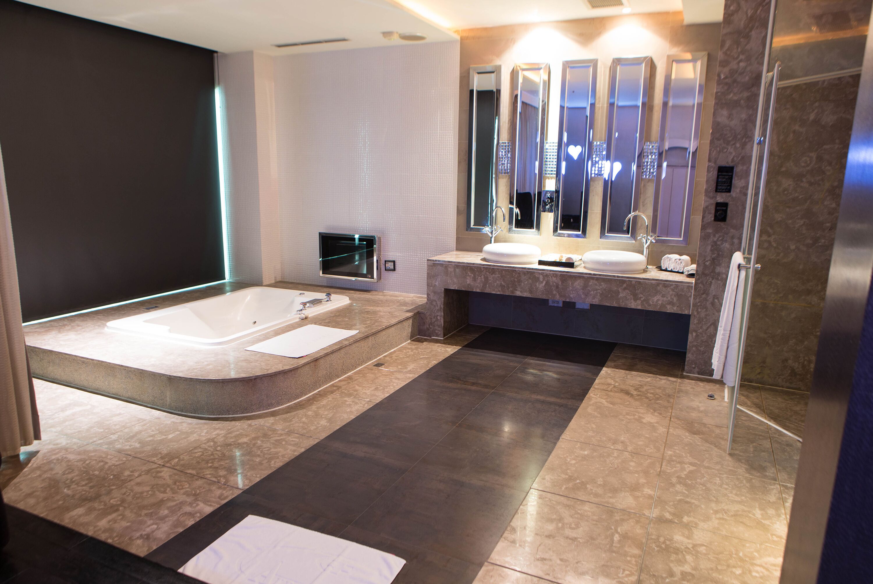 platinum suite (check in time starts from 6pm) | bathroom | separate bathtub and shower, free toiletries, hair dryer, slippers