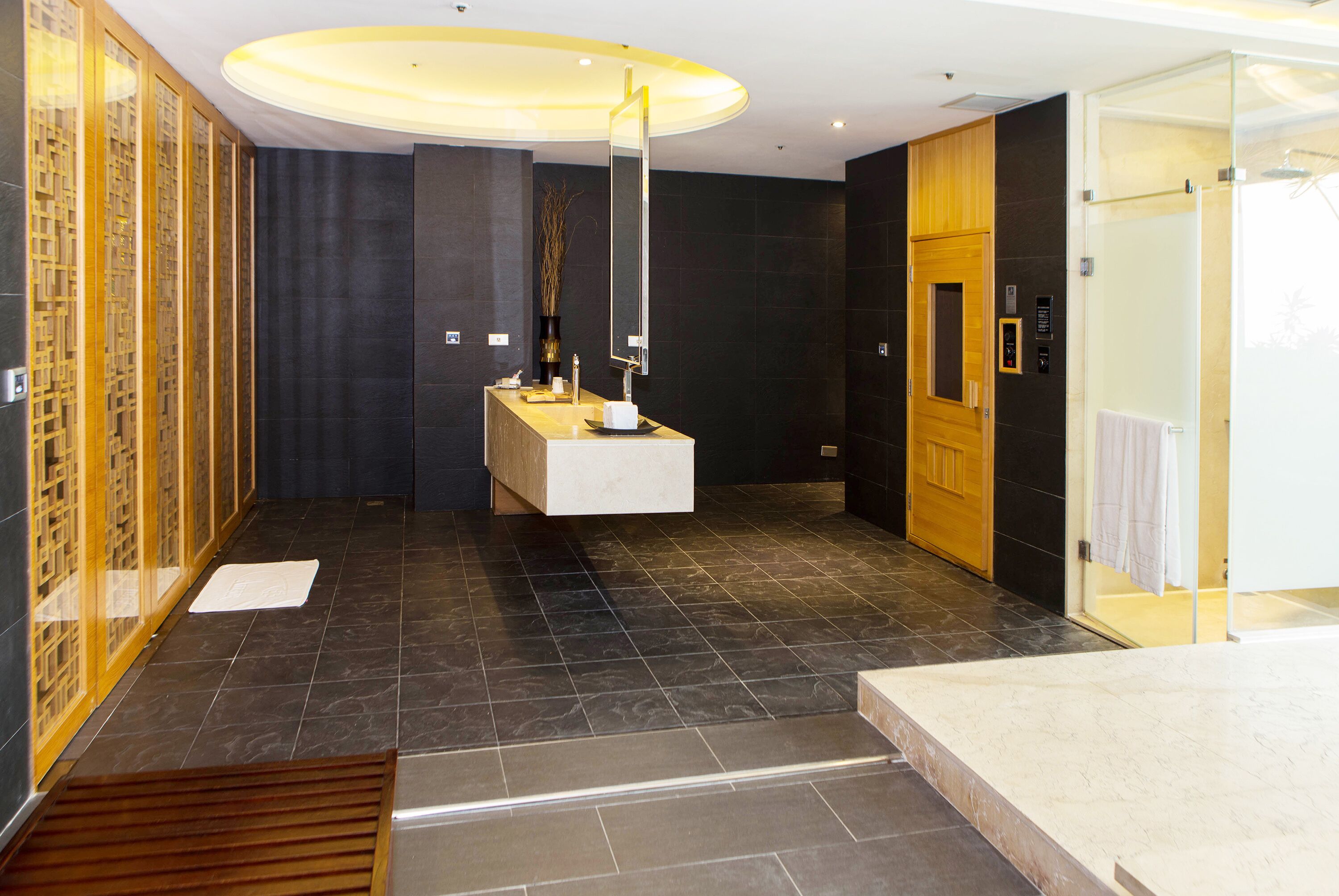 flagship suite (check in time starts from 6pm) | bathroom amenities | separate bathtub and shower, free toiletries, hair dryer, slippers