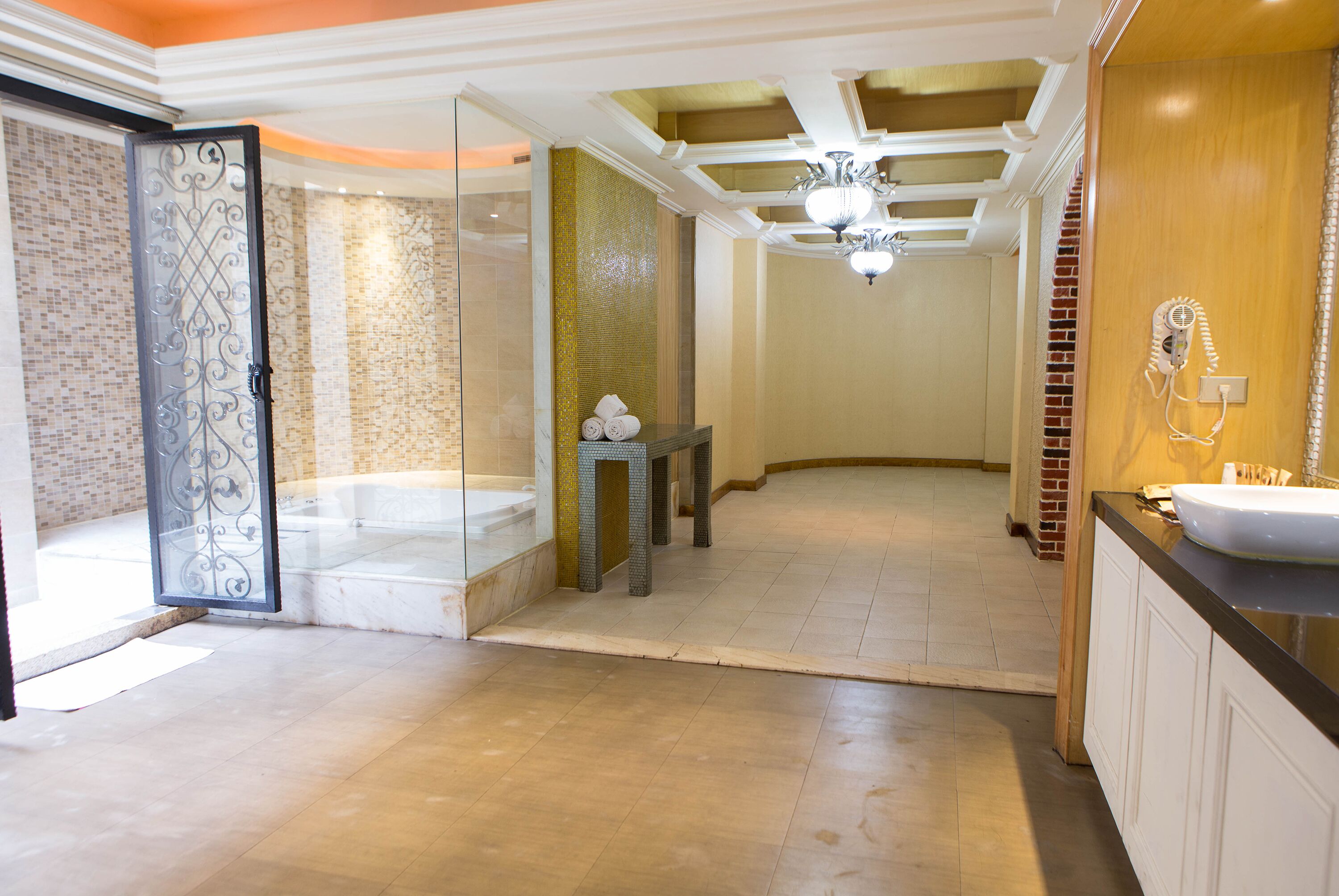 flagship suite (check in time starts from 6pm) | bathroom | separate bathtub and shower, free toiletries, hair dryer, slippers