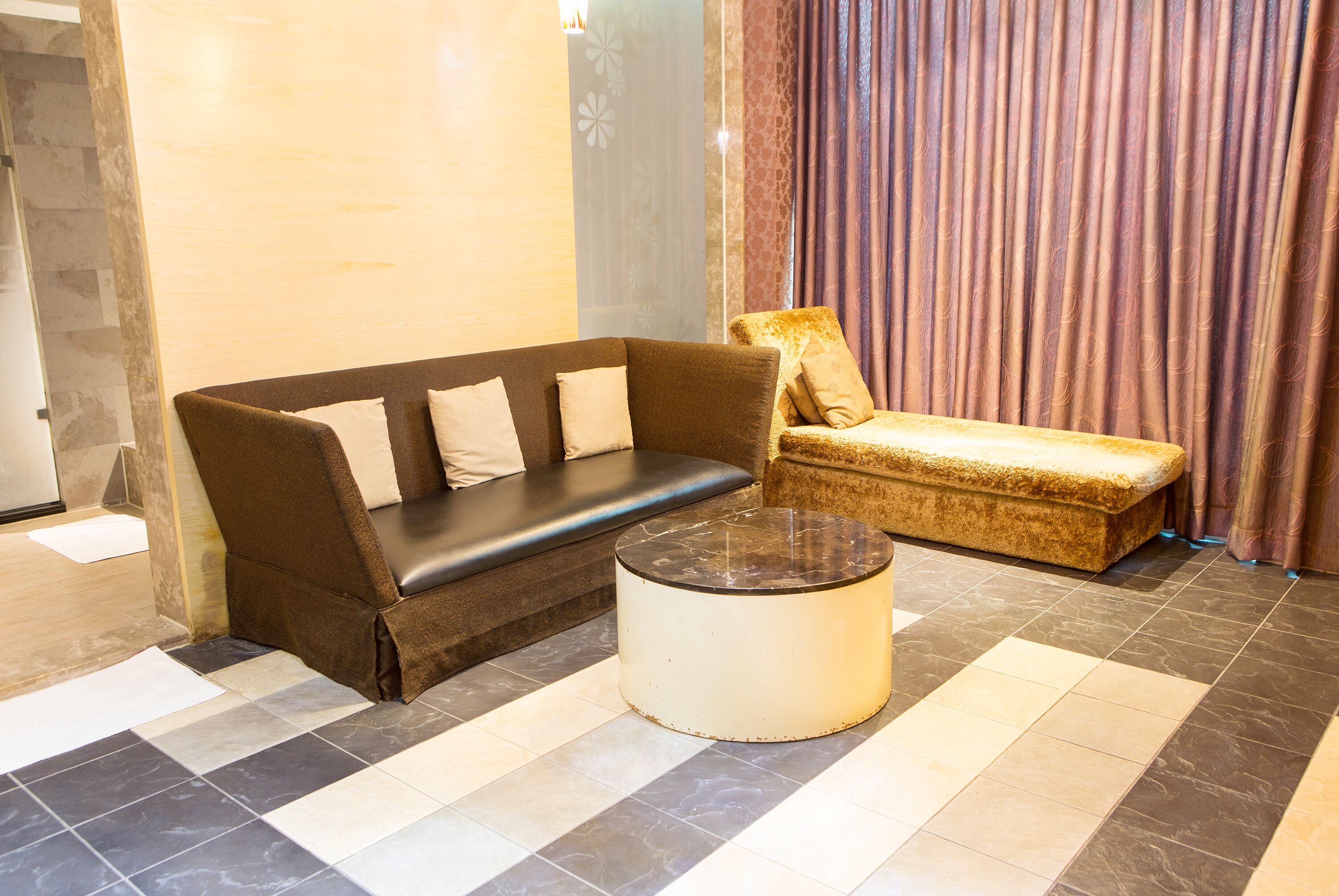 standard suite (check in time starts from 6pm) | living room | 42-inch tv with digital channels