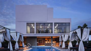 Outdoor pool, open 6:00 AM to 9:30 PM, pool umbrellas, pool loungers