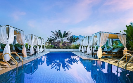 Outdoor pool, open 6:00 AM to 9:30 PM, pool umbrellas, sun loungers