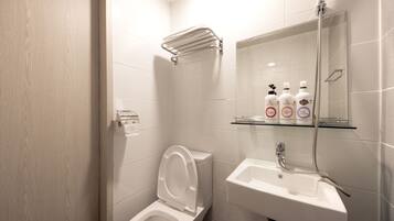 Standard Double Room | Bathroom | Shower, hair dryer, slippers, towels