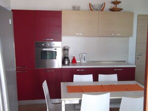 Deluxe Penthouse, 4 Bedrooms, Terrace, Ocean View | Private kitchen | Full-sized fridge, oven, stovetop, coffee/tea maker - Apartment Ocean Front Praia Estoril (Boa Vista)