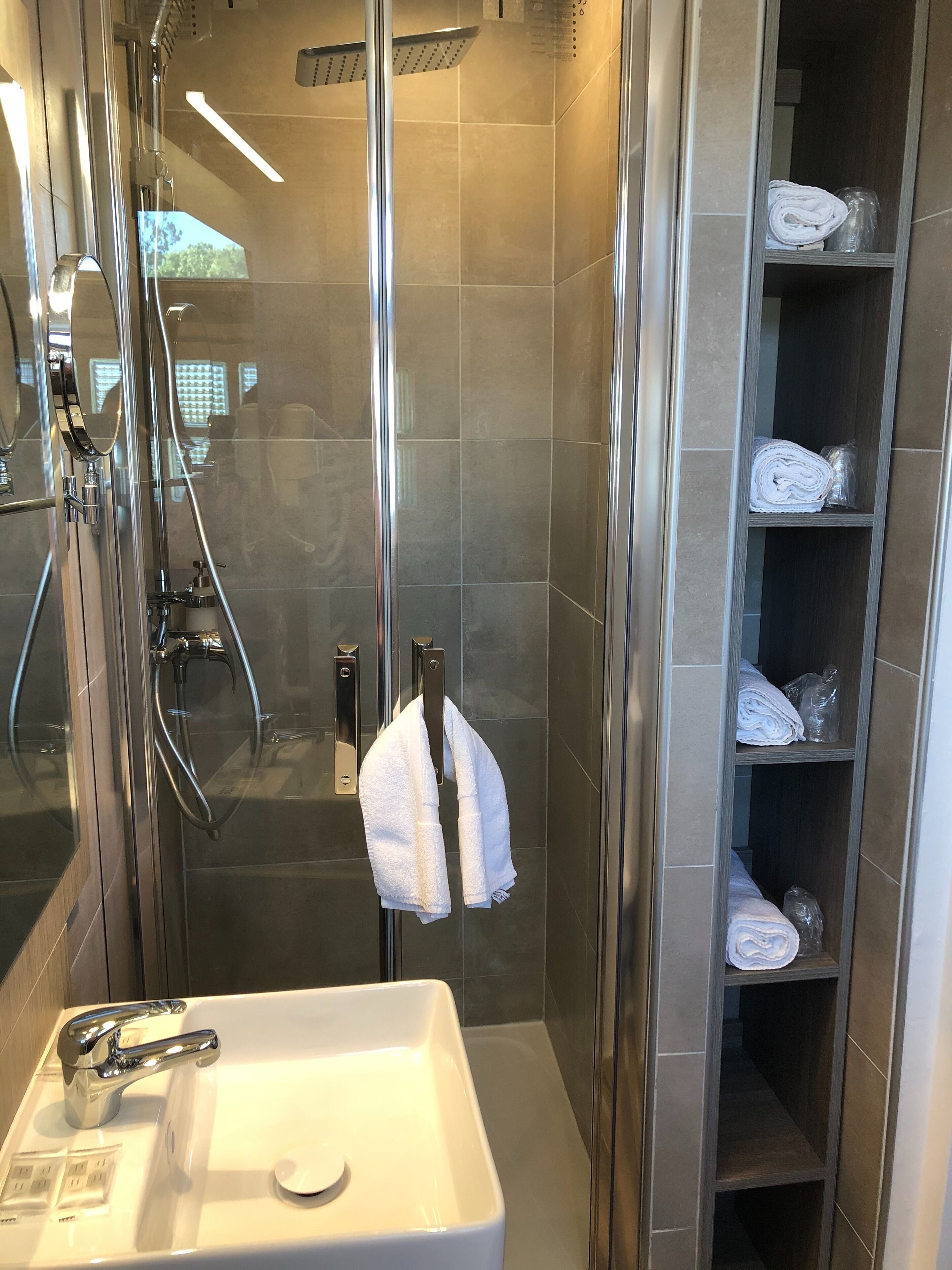 family quadruple room | bathroom | shower, rainfall showerhead, free toiletries, hair dryer