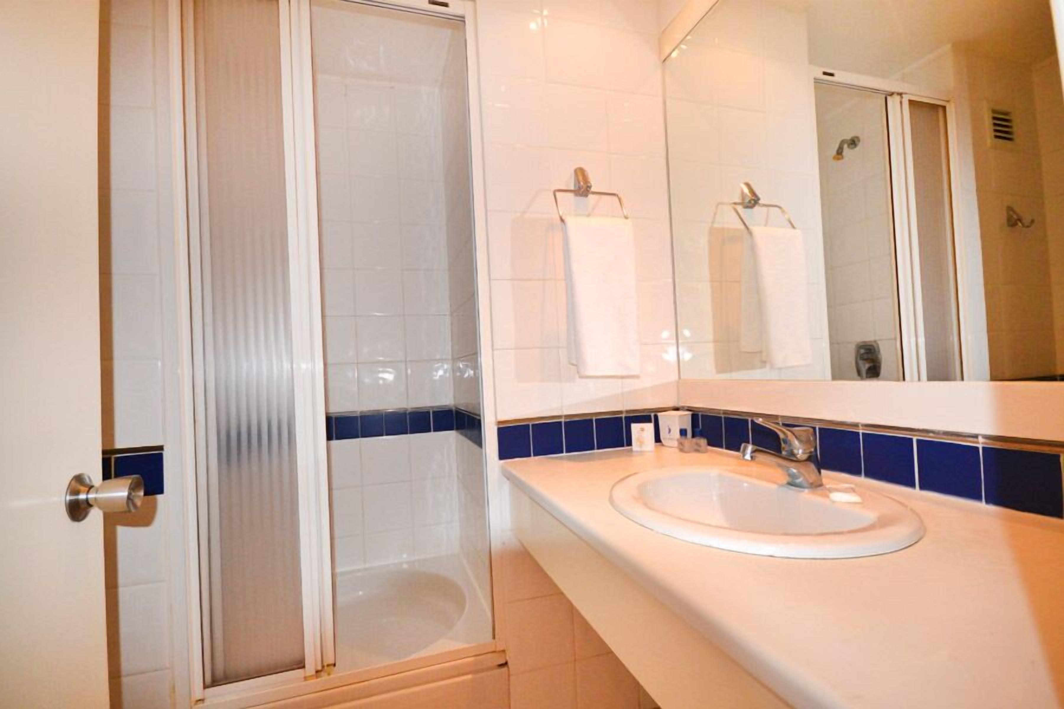 shower, free toiletries, hair dryer, slippers