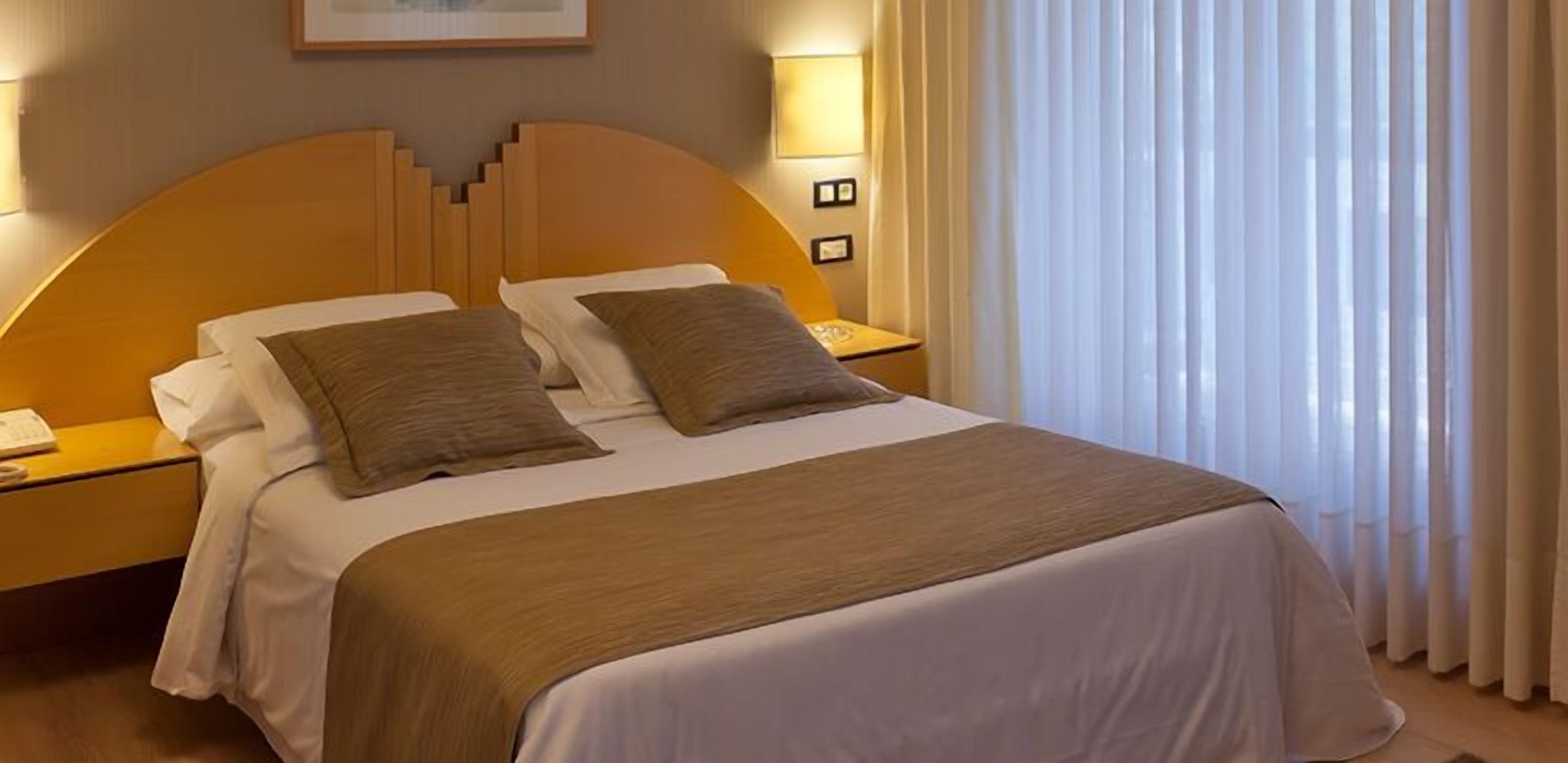business double or twin room | egyptian cotton sheets, down duvets, desk, blackout curtains