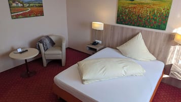 Comfort-Einzelzimmer | Allergikerbettwaren, Zimmersafe, Schreibtisch