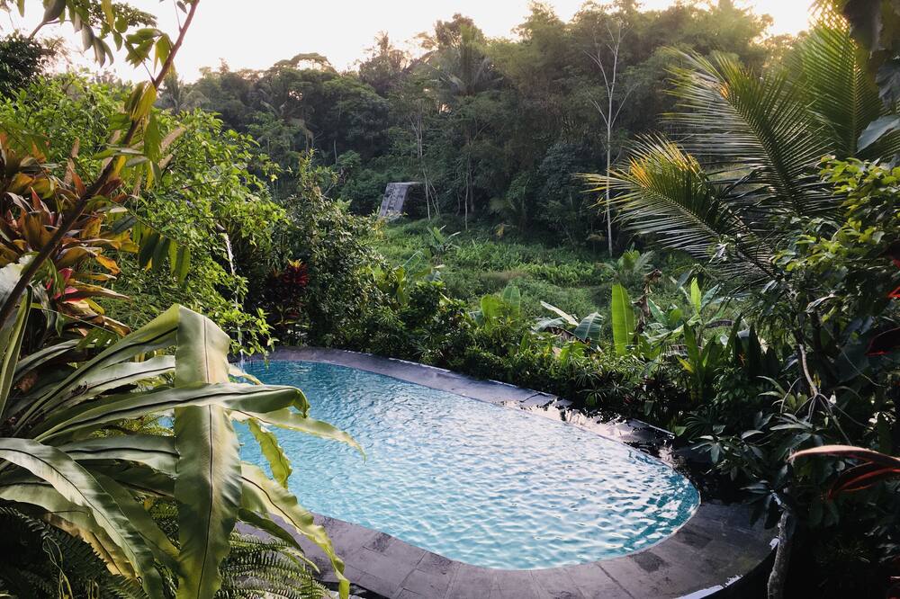 The Riverside Javanese Cottages