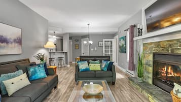 Falaises 138-01 | Living area | Flat-screen TV, fireplace, DVD player