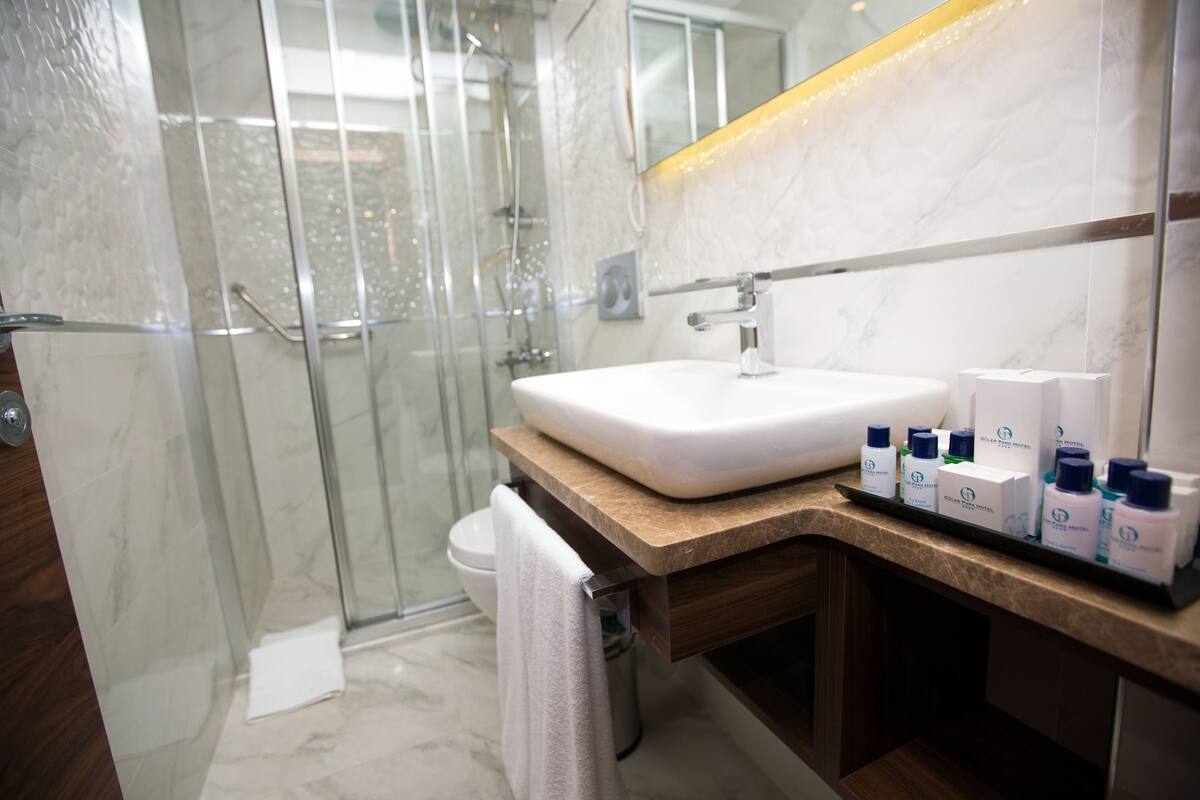 free toiletries, hair dryer, slippers, towels