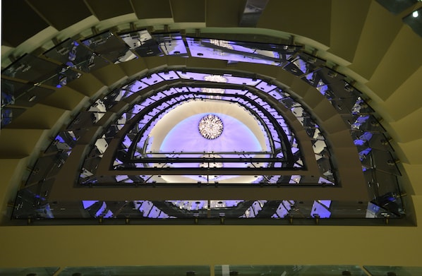 A multi-level atrium with a central dome and multiple balconies. - Guler Park Hotel (Bursa)
