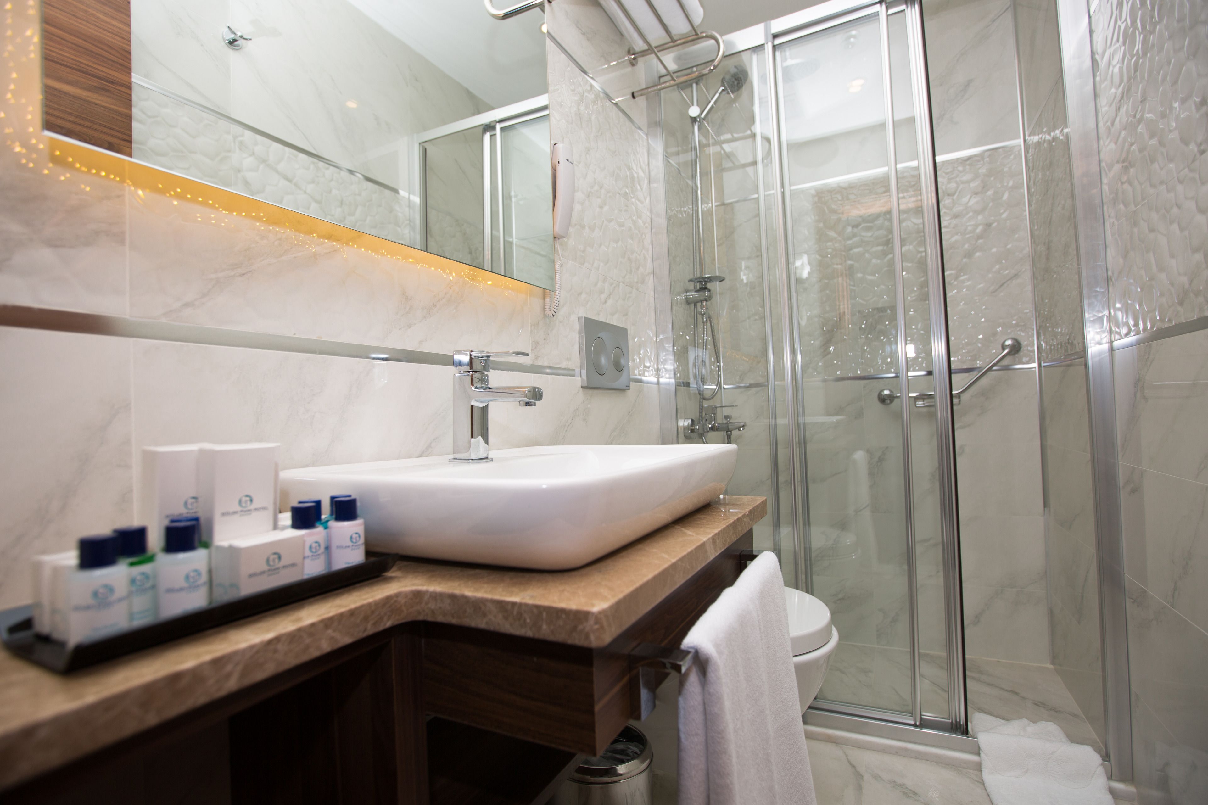 free toiletries, hair dryer, slippers, towels