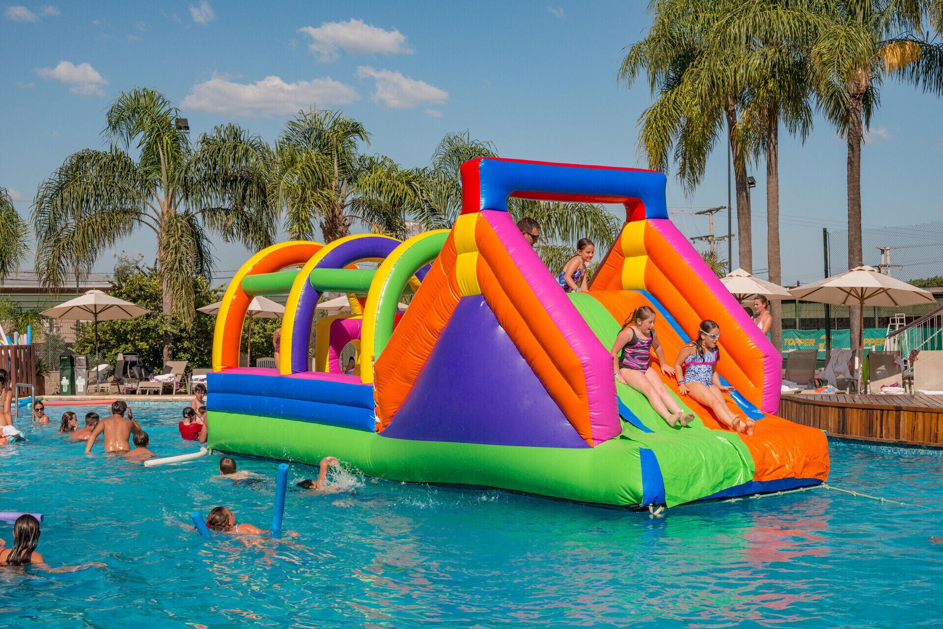 Indoor pool, outdoor pool, pool umbrellas, pool loungers