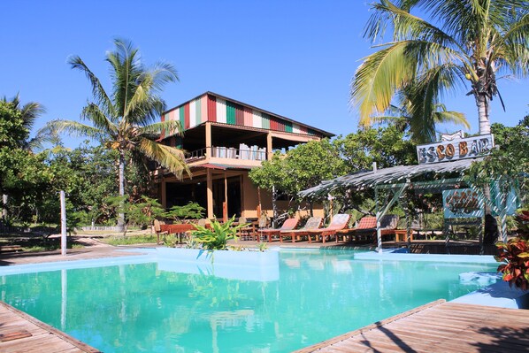 Outdoor pool, open 7 AM to 11 PM, pool loungers