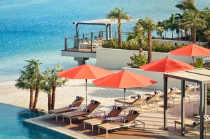 Outdoor pool, pool umbrellas, sun loungers