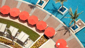 Outdoor pool, pool umbrellas, pool loungers