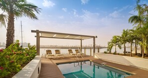 Outdoor pool, pool umbrellas, pool loungers