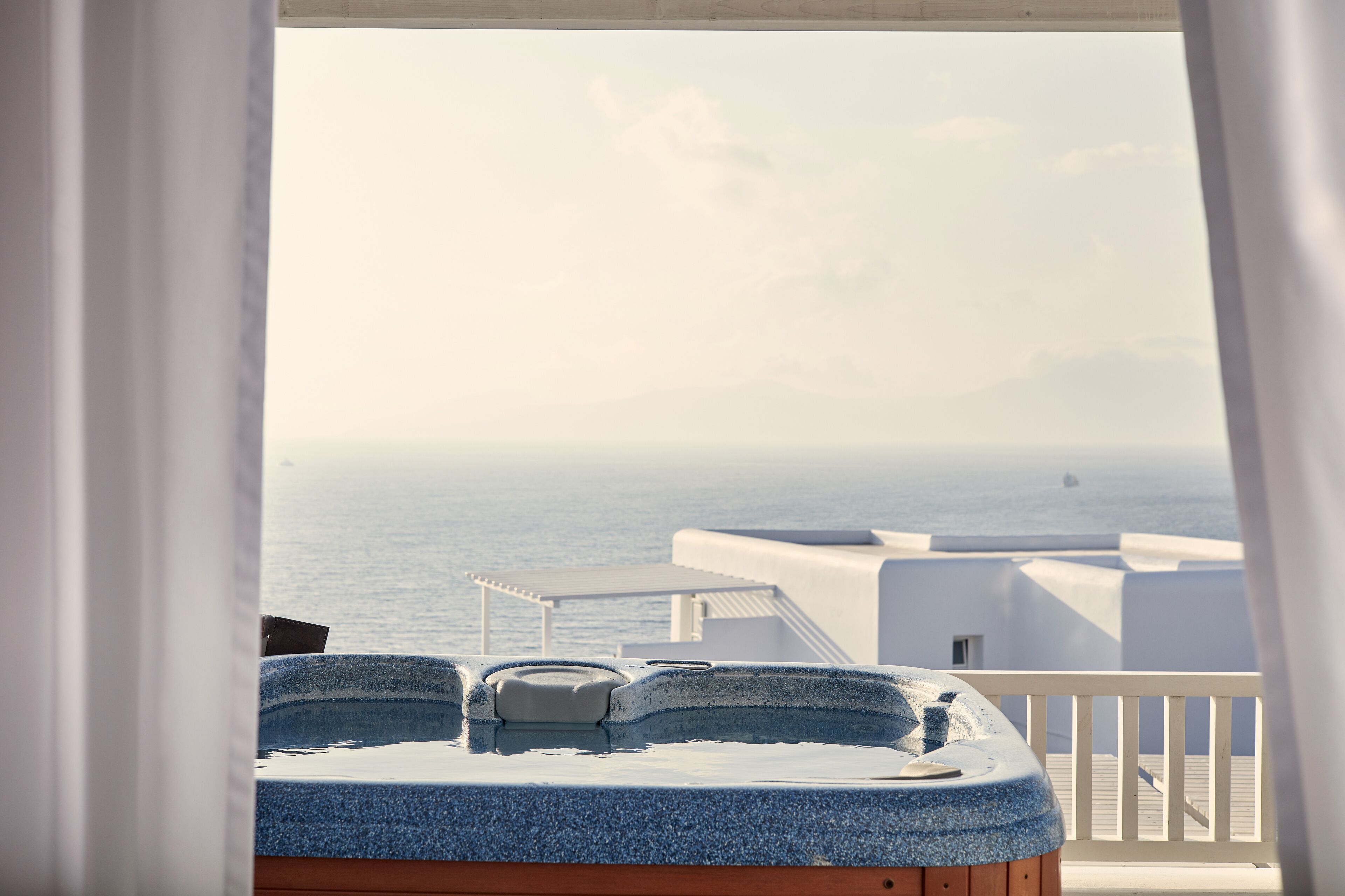 delos premium suite with outdoor jetted tub and private pool | terrace/patio