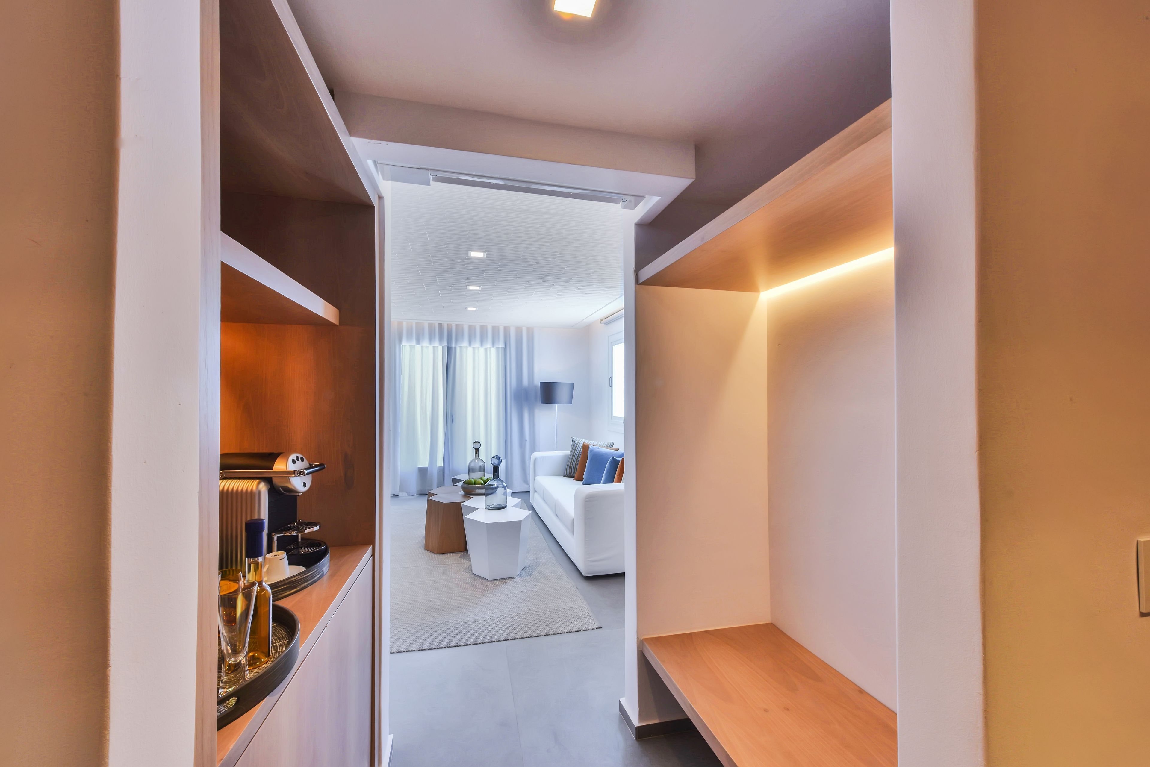 delos premium suite with outdoor jetted tub and private pool | living area | 45-inch flat-screen tv with satellite channels, tv