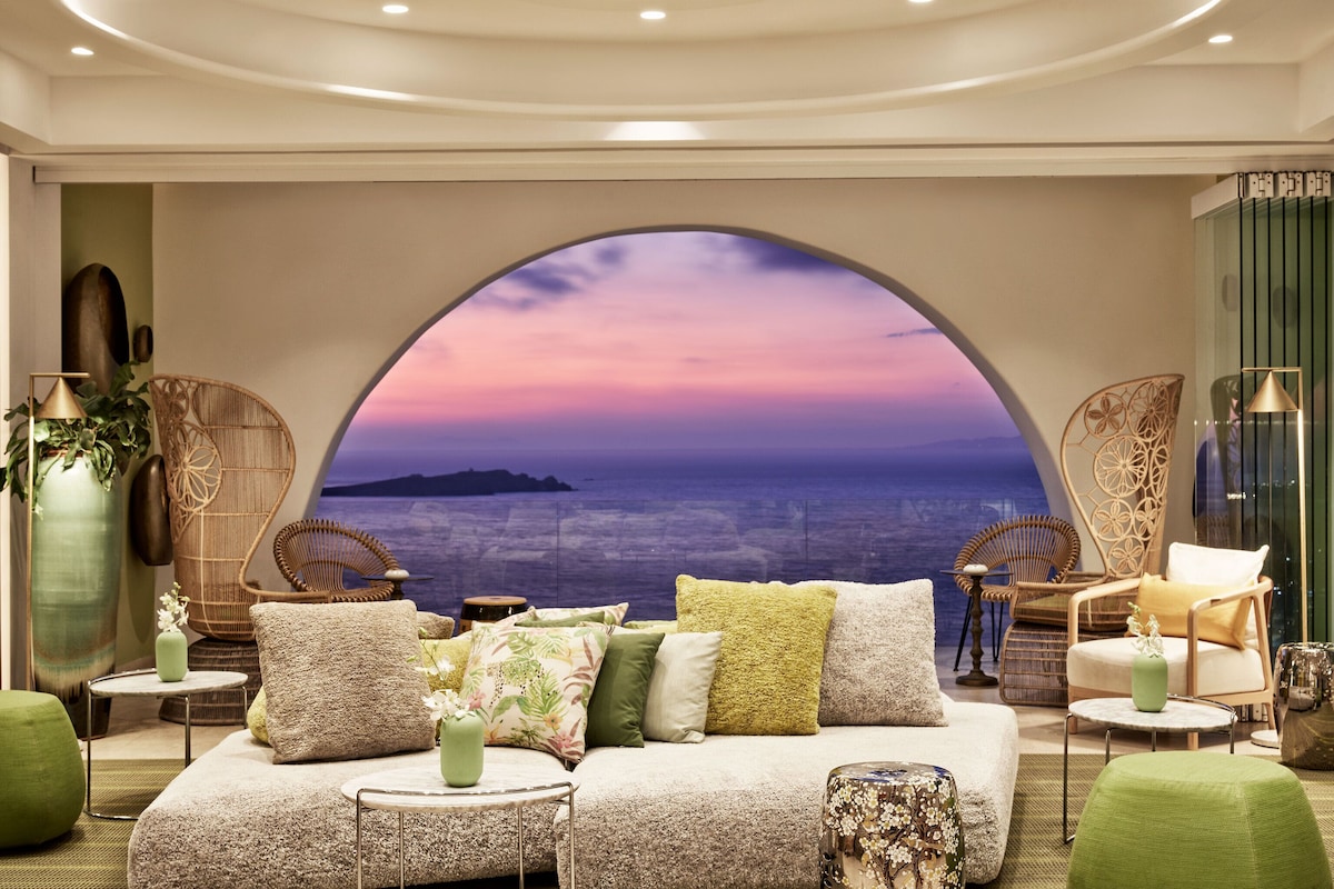 Myconian Korali Mykonos Lobby Sitting Area with beautiful sunset views